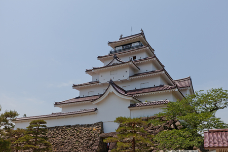 AIZUWAKAMATSU, JAPAN - MAY 30, 2017: Reconstructed Main Keep of Aizu-Wakamatsu Castle (Tsuruga-jo), Japan. Castle was founded in 1384 by Ashina Naomori, demolished in 1874 and reconstructed in 1965のeditorial素材