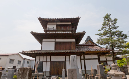 AIZUWAKAMATSU, JAPAN - MAY 30, 2017: Survived Gosangai Turret of Aizu-Wakamatsu Castle (Tsuruga-jo, founded in 1384), Japan. Was relocated to Amida-ji Temple in 1686