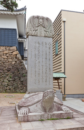 OKAZAKI JAPAN - MAY 31, 2017: Stone with teachings of deified in Shinto shogun Tokugawa Ieyasu in Okazaki castle. Castle was founded in 1455 by Saigo Tsugiyori, Tokugawa Ieyasu was born here in 1543のeditorial素材