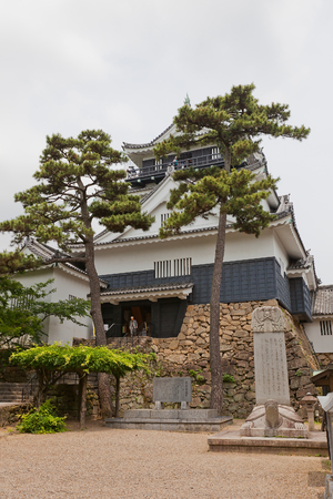 OKAZAKI JAPAN - MAY 31, 2017: Reconstructed Main Keep (donjon, circa 1959) of Okazaki Castle, Japan. Castle was founded in 1455 by Saigo Tsugiyori, shogun Tokugawa Ieyasu was born here in 1543のeditorial素材