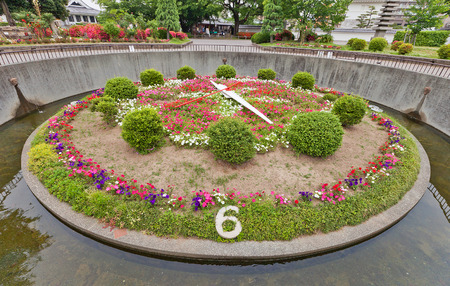 OKAZAKI, JAPAN - MAY 31, 2017: Flower Clock in in Okazaki Castle, Aichi Prefecture, Japan. Created in 1960, moved by a direct current motor of 1/10 horse powerのeditorial素材