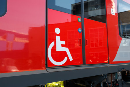 Sign disabled person on the carriage of a passenger train, closeup.の写真素材
