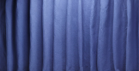 Wavy dark blue textured waffle fabric.の写真素材
