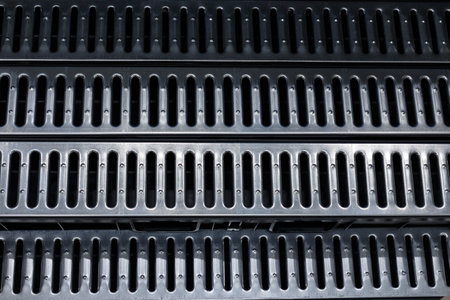 Drainage tray with metal grating, soft focus.の写真素材