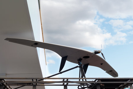 Compact airplane type drone on a bracket. Zhukovsky, Russia, July 24, 2021.のeditorial素材