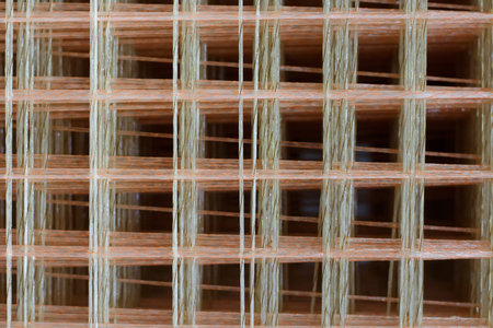 Fiberglass construction reinforcement, square mesh mesh for strengthening structures.