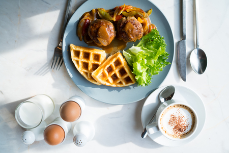 morning breakfast with meat, waffle egg , milk and coffee , top view with copy spaceの写真素材