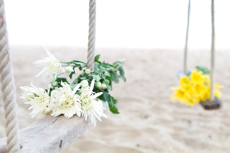 swing decorated with flowersの写真素材