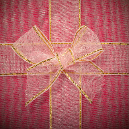 It is Pink bow on pink textile for pattern.の写真素材
