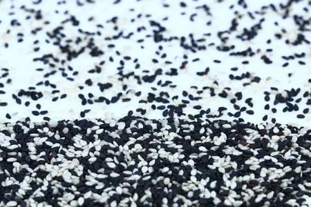 It is Sesame seeds isolated on white.の写真素材