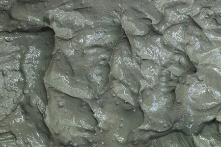 It is Mixing cement for pattern and background.