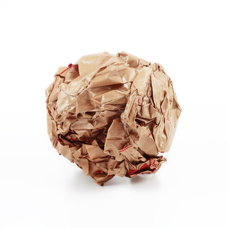 It is Brown crumpled paper isolated on white.の写真素材