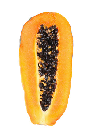 It is Half sliced papaya isolated on white.の写真素材