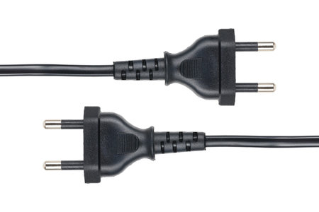it is black electric plug with cable isolated on white.