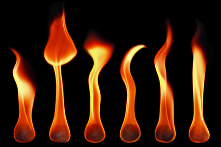 it is fireballs and flames isolated on black.の写真素材