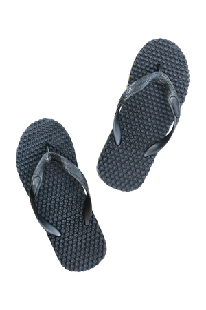 it is black sandals isolated on white.の写真素材