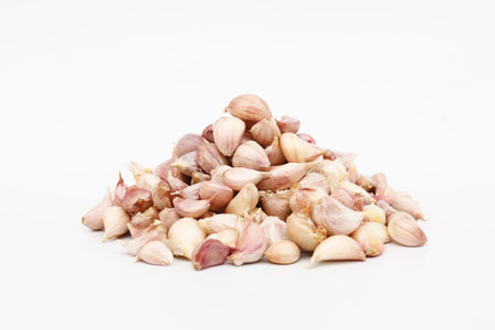 pile of garlic isolated on white.の写真素材