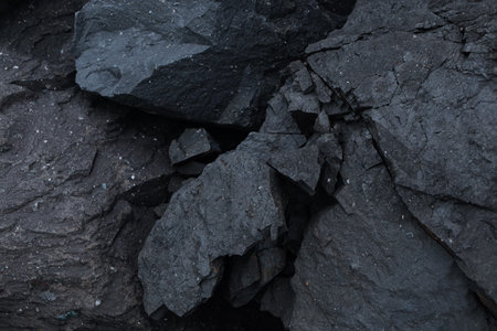 breaking black hard rock for pattern and background.