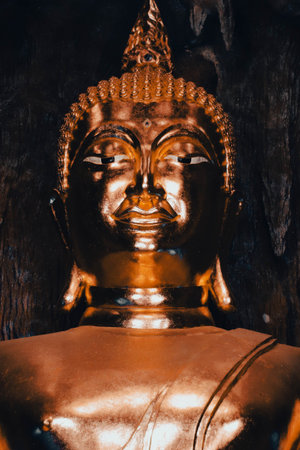 Golden buddha statue in Ayutthaya, Thailand.の写真素材