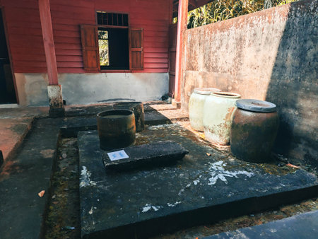 Old water well in the village of Mae Salong, Thailand.の写真素材