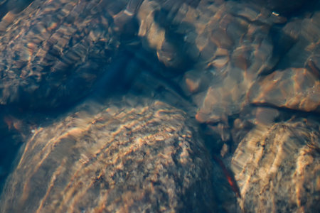 abstract background of water and stone in the river close-up
