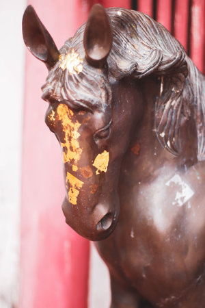 Horse statue in Thai temple, Thailand. (Selective focus)の写真素材
