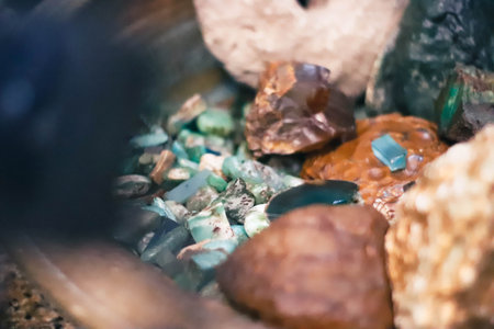 Colorful stones in a glass aquarium. Selective focus. Toned.の写真素材