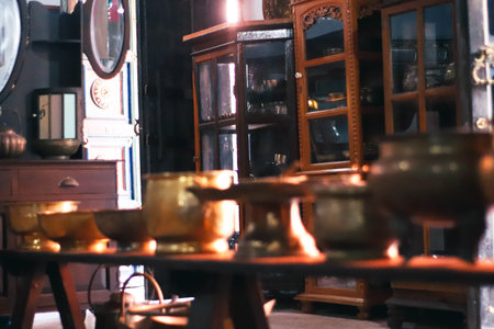 Antique brass tableware in a Chinese tea shop, Beijing, Chinaの写真素材