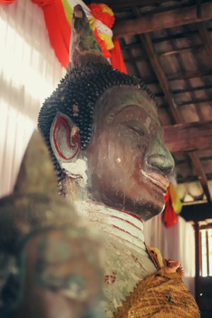 Buddha statue in thai temple, vintage color tone.