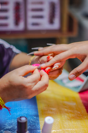 Manicure process in a beauty salon, close-up.の写真素材