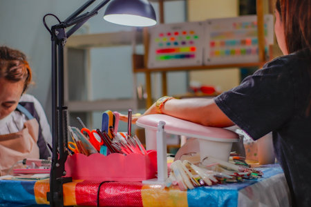 Close-up of a female manicurist working in her workshopの写真素材