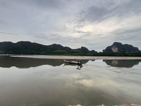 Fishing boat on the beach in the evening. Krabi, Thailand