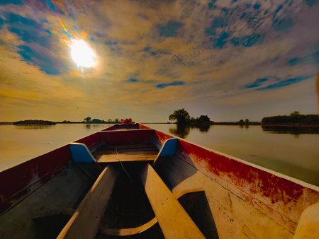 boat on the lake at sunset,Thailand   Long tail boat