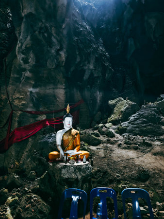 Buddha statue in the cave at Tham Pha Luang, Loei, Thailandの写真素材