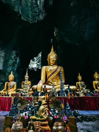 Buddha statue in the cave, Thailand. They are public domain or treasure of Buddhism.の写真素材