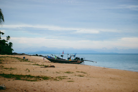 Fishing boat on the beach in Koh Samui, Thailand.の写真素材