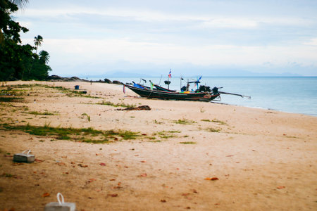 Fishing boat on the beach in Thailand. Selective focus.の写真素材