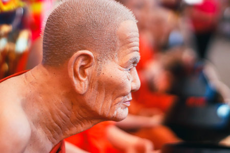 Unidentified Buddhist monk during a religious ceremony in Kolkata.の写真素材