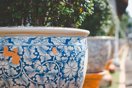 Colorful ceramic pottery in the garden, Thailand. Vintage style.の写真素材