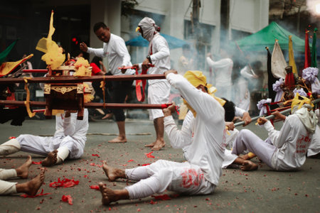 Hindu devotees perform a religious ritual during Thaipusam festival.の写真素材