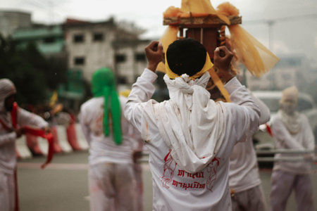 Unidentified people take part in a religious procession.