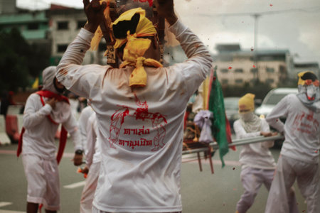 Unidentified people take part in the annual Thaipusam festival in Bangkok, Thailand.の写真素材