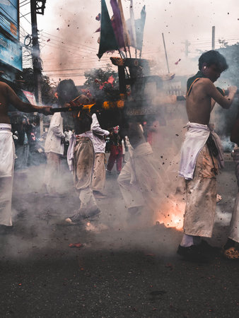 Hindu devotees take part in a procession during the Ganga Aarti festival in Kolkata.の写真素材