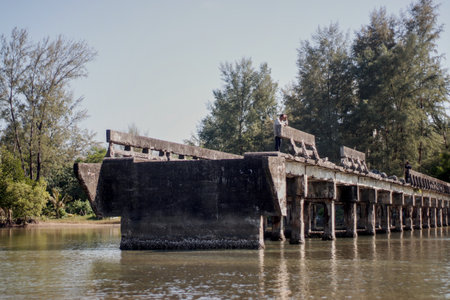 Old concrete bridge over the river.の写真素材