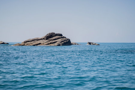 Rocky coast of the Mediterranean Sea. View from the sea.の写真素材