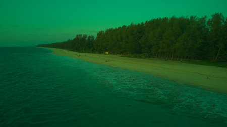 Beautiful seascape with green sea and blue sky background.