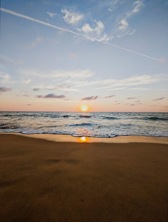 Beautiful sunset on the beach. Summer landscape. Sunrise on the beach.の写真素材
