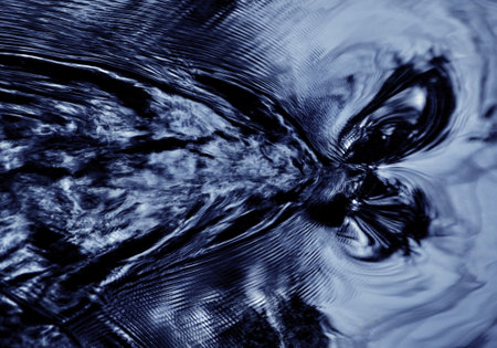 background dark blue eyes resembling the flow of the river spiritの写真素材