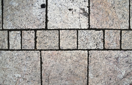 background or texture with lumps of stone tilesの写真素材