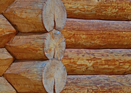 background or texture of wooden house corner jointsの写真素材